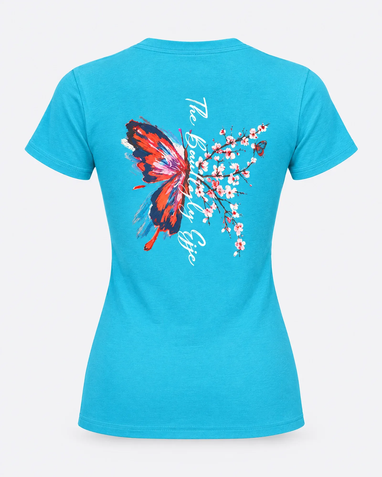 Espalda de una playera turquesa con una mariposa roja y azul pintada a pincel, una rama de cerezo y la frase The Butterfly Effect.